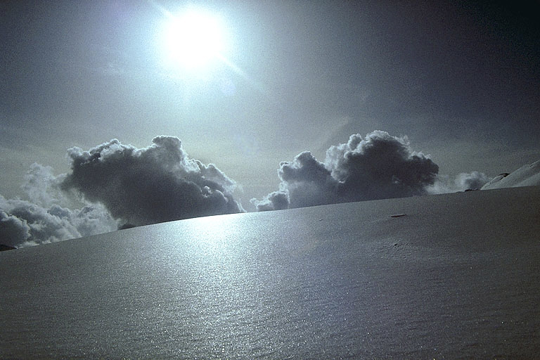 Sun, snow and clouds - larger format