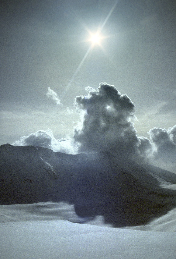 Sun, snow, clouds - larger format